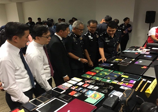 Singapore and Malaysia police arrest 27 from cross-border Internet love scam syndicates