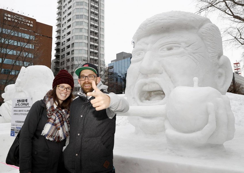 Japan's snow festival opens with ice replicas of Trump, Pikotaro