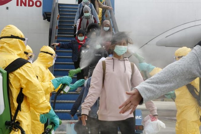Footage of Indonesian flight passengers from Wuhan getting sprayed with chemicals go viral