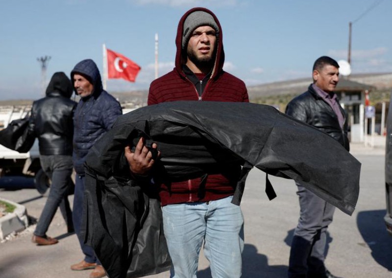 'We're just fleeing from death to death': In black body bags, Syrians in Turkey make final journey home