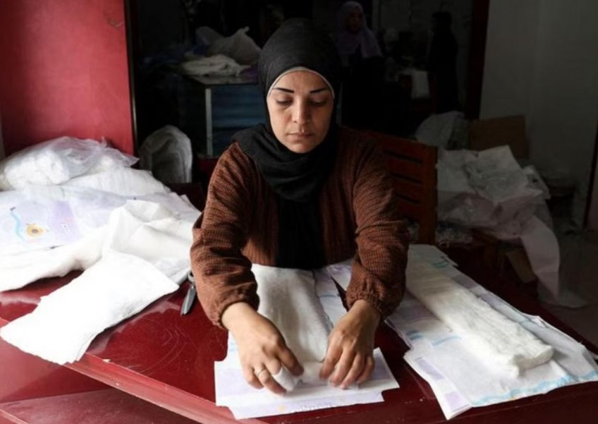 Diapers instead of bridal gowns: Gaza tailors adapt to wartime needs