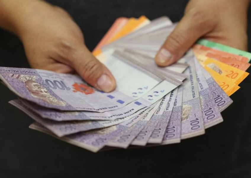 Malaysia PM Anwar says ringgit fall concerning but must look at comprehensive view