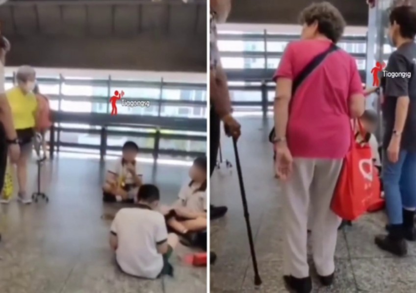 Schoolboys and elderly folks clash at MRT station, splitting public opinion