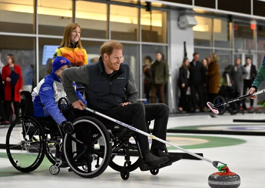 Prince Harry tries wheelchair curling ahead of Invictus Games' first winter edition next year