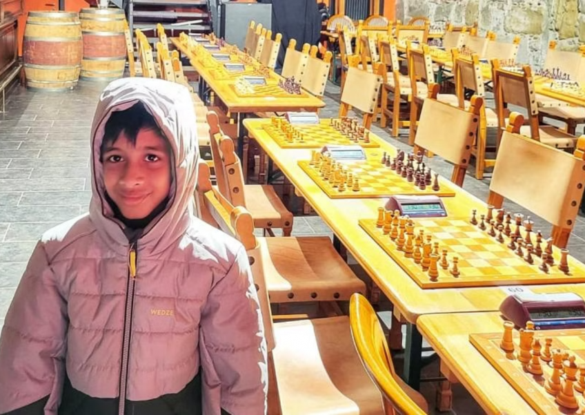 8-year-old living in Singapore becomes youngest chess player to beat a grandmaster