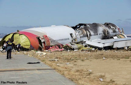 Asiana crash aftermath video shows firefighters warned about teen