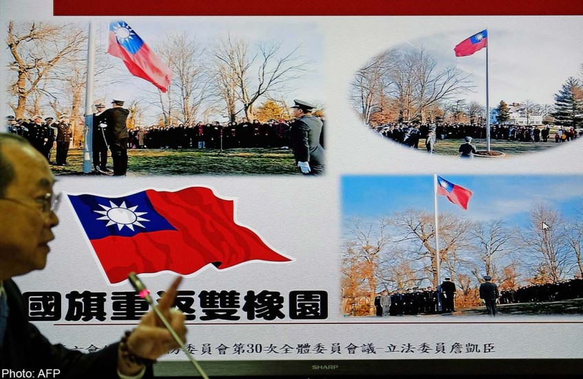 Taiwan 'regrets' embarrassing Washington with flag-raising