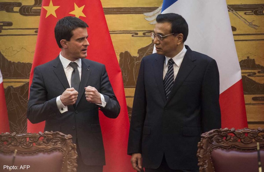 French PM Valls stops short of calling China an ally
