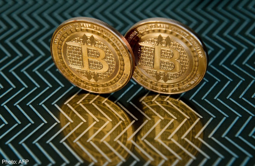 Hong Kong lawmakers urge ban on bitcoin as scam victims turn to police