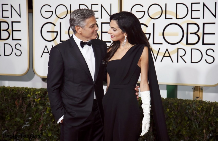 With humour and humility, Clooney accepts lifetime Golden Globe