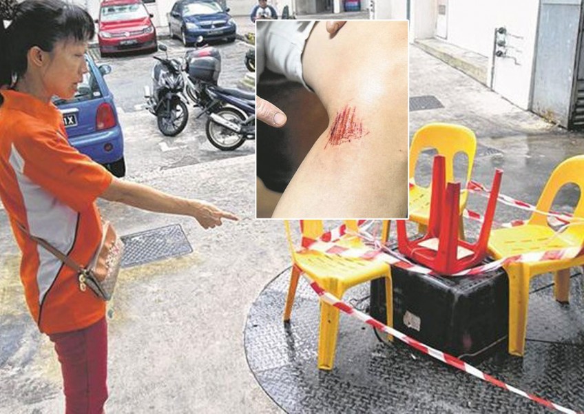 ITE lecturer injured after grease trap cover collapses; coffee shop owner refuses to take responsibility