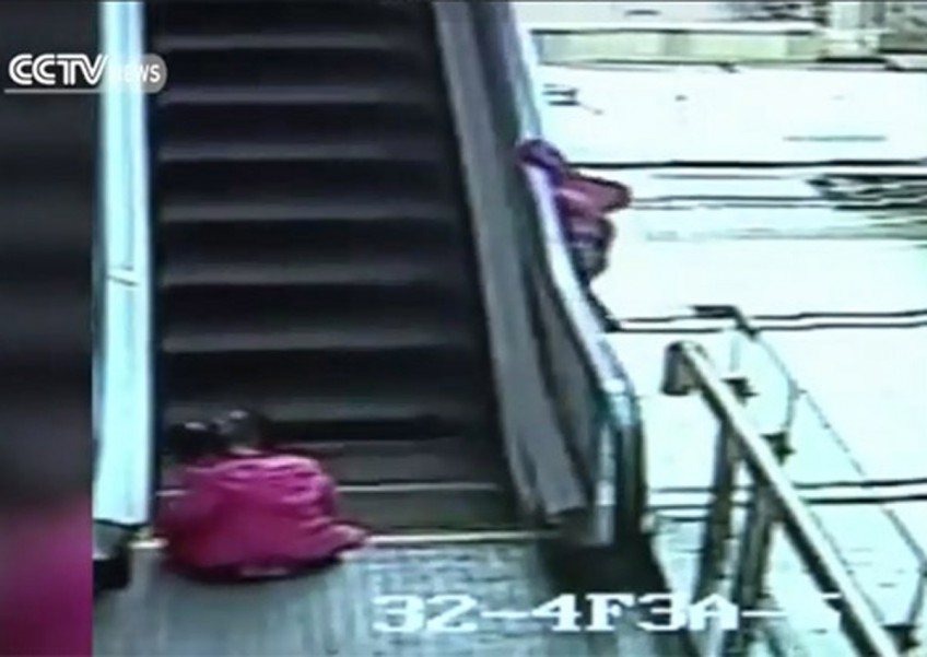 Video captures young girl's death fall from Kunming mall escalator