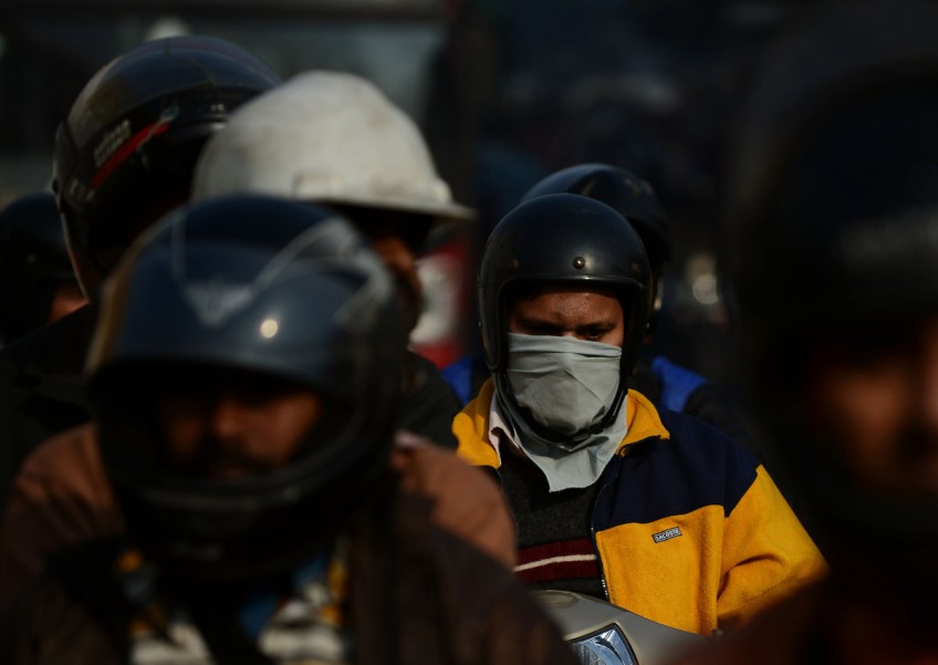 India's smog-shrouded capital pulls cars off roads
