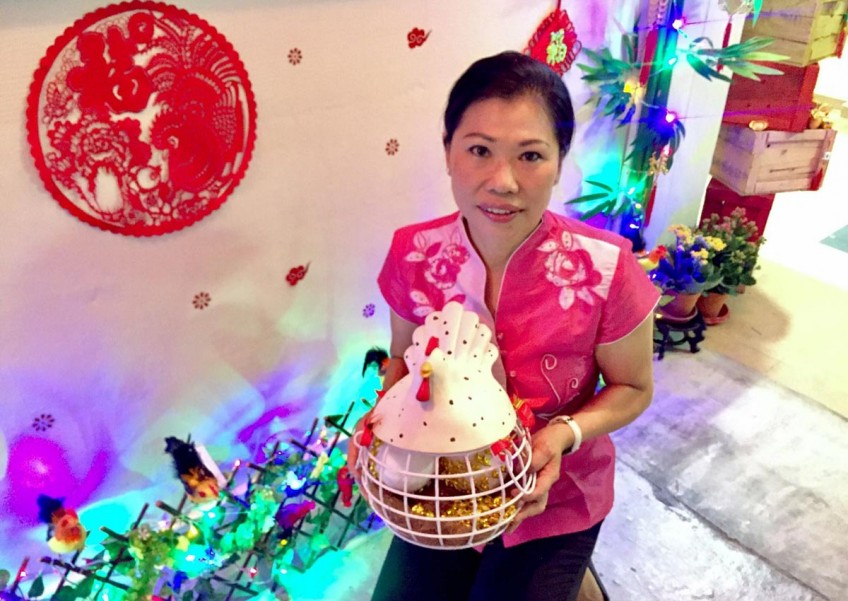 Bedok resident decorates her HDB corridor for Chinese New Year, in memory of late father