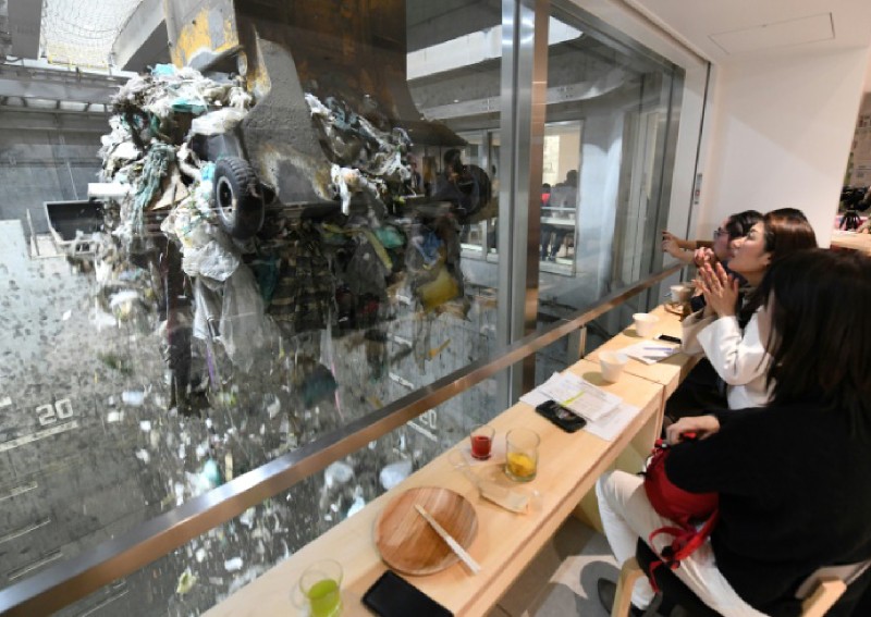 Tipples and trash: A Japan waste plant opens its doors