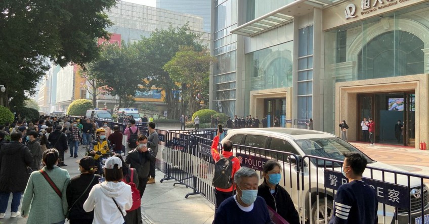 'Return our money!' Evergrande investors protest at office of Chinese developer
