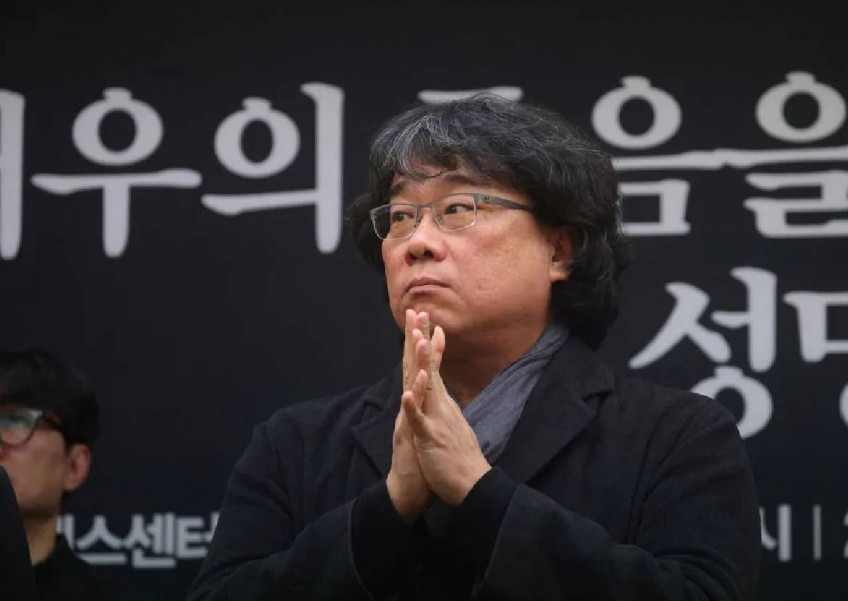 Parasite director Bong, South Korean artists urge probe into handling of actor case
