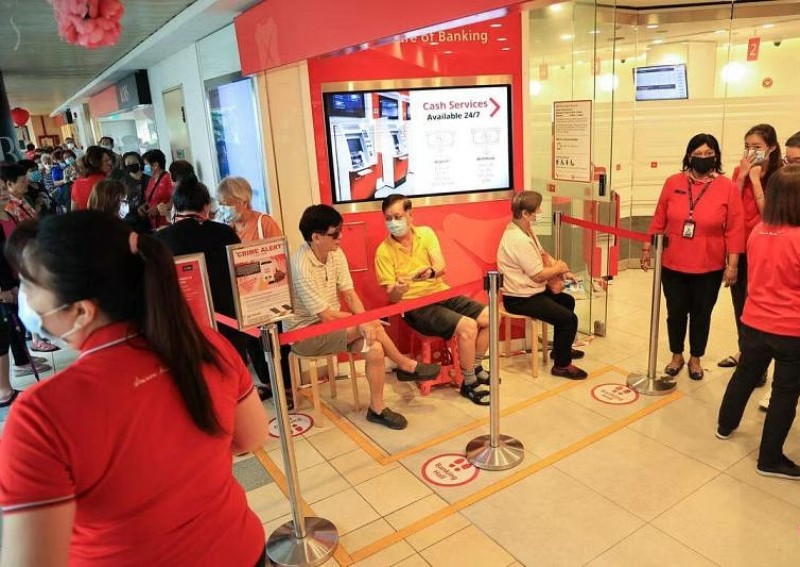 'I just came to try my luck': Long queues at banks for new CNY notes with some turning up as early as 5am