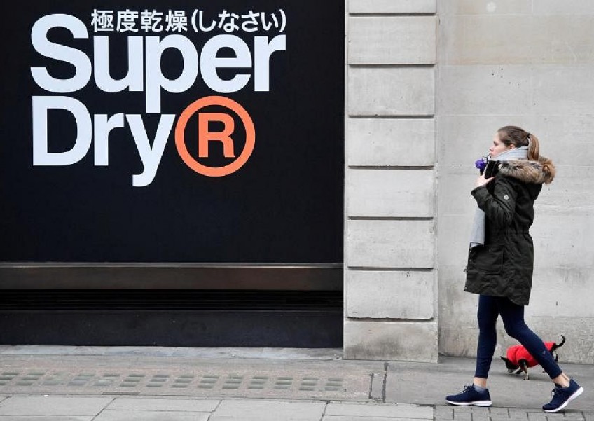 Superdry to weigh restructuring, including store closures, job cuts