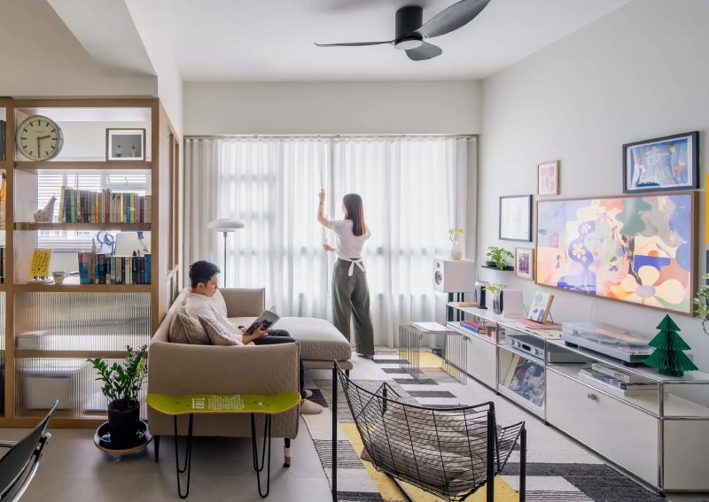 Inside a couple's playfully curated HDB home with a TV gallery wall