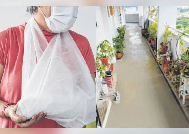 Elderly woman dislocates arm after falling on newly coated floor of HDB corridor, wonders why area wasn't barricaded