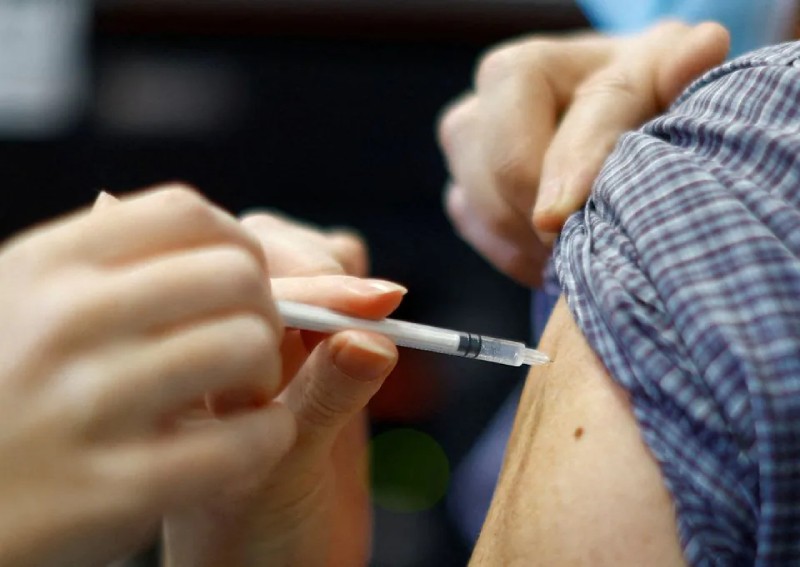 WHO sees 'incredibly low' Covid-19, flu vaccination rates as cases surge