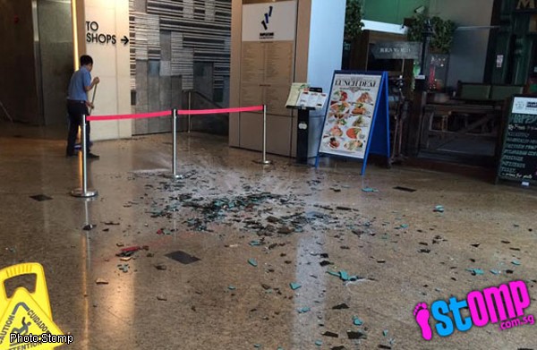 Falling glass ceiling narrowly misses hitting woman at Somerset mall