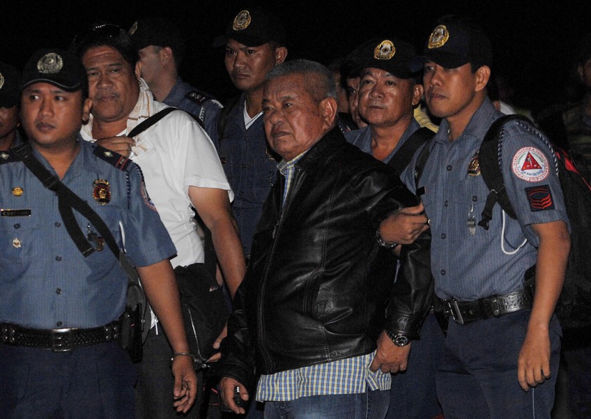 Philippine massacre widows 'cannot forgive' warlord suspect