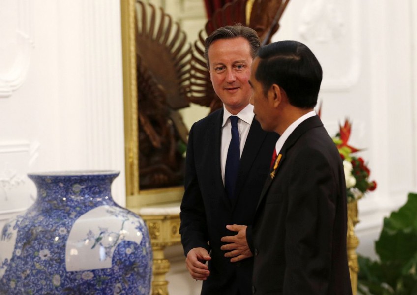 British PM heads to Southeast Asia with trade, IS on agenda