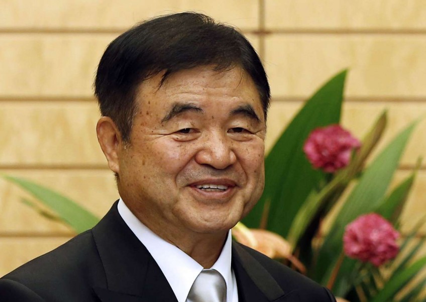 Japan Olympics minister refutes reports of illegal funds