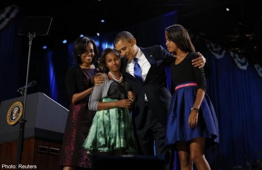 Obama's parenting advice: give kids lots of love and a few rules