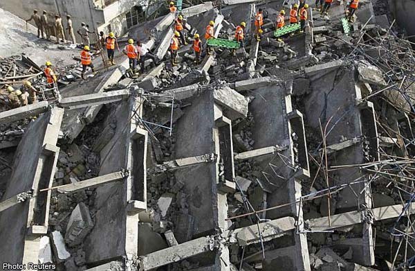 Builders blamed as India collapse toll rises to 17