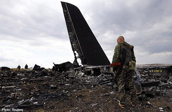 Ukraine promises "adequate response" over shot-down plane