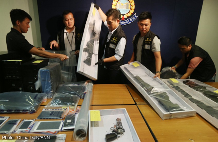 9 arrested in plot to bomb 2 HK city districts