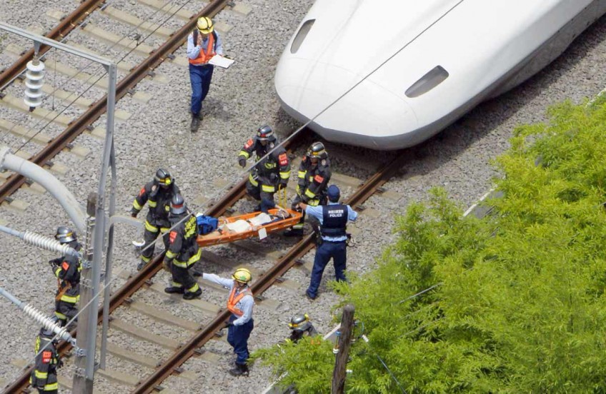Two feared dead in Japan bullet train suicide fire: official