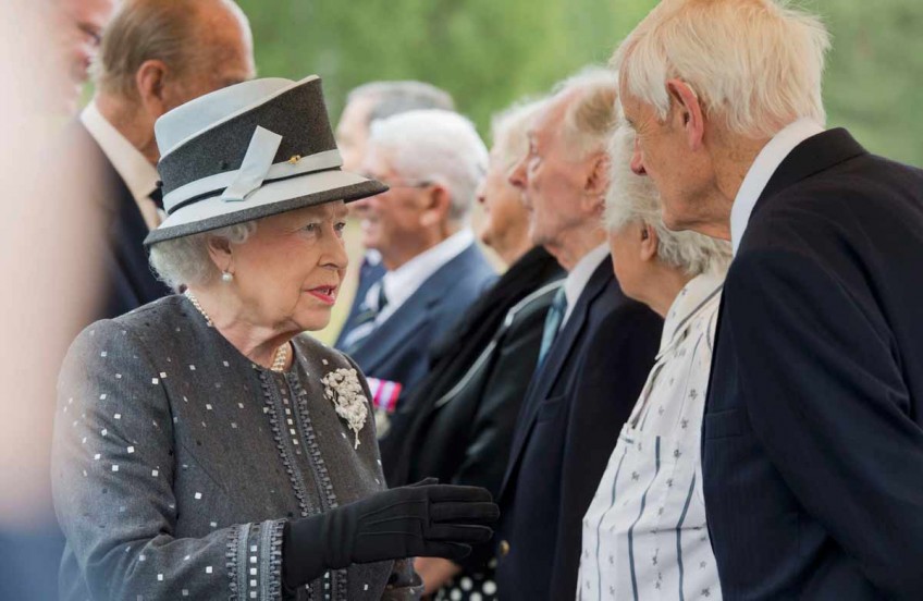 Britain's queen makes first visit to ex-Nazi concentration camp