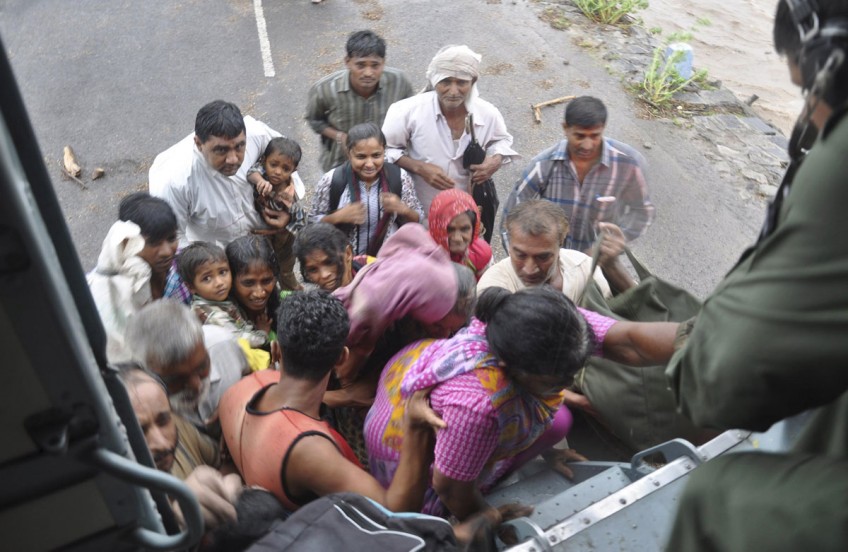 Floods kill 55 in western India as relief work continues