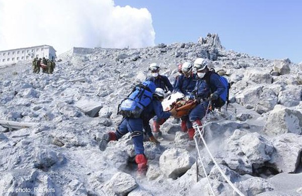 Japan body searchers return to volcano, eight months on