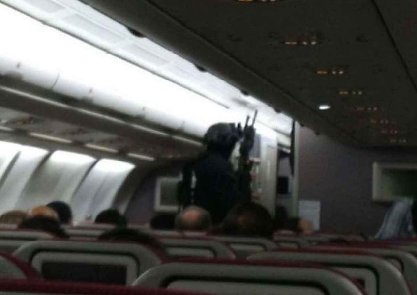 Passengers and crew tackle man who tried to hijack Malaysia Airlines MH128