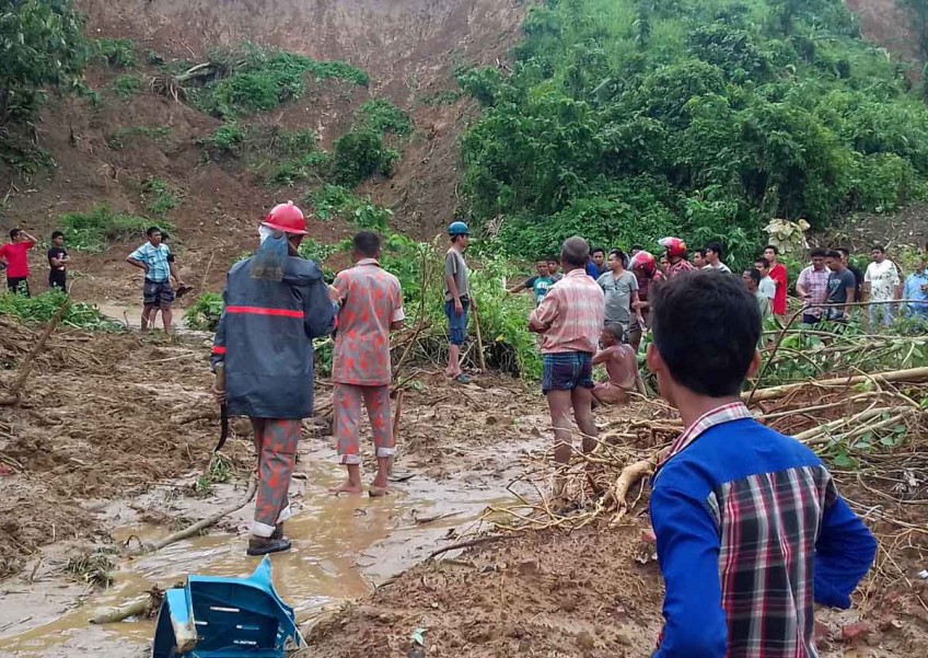 Rescuers battle to reach victims Bangladesh's deadliest landslides