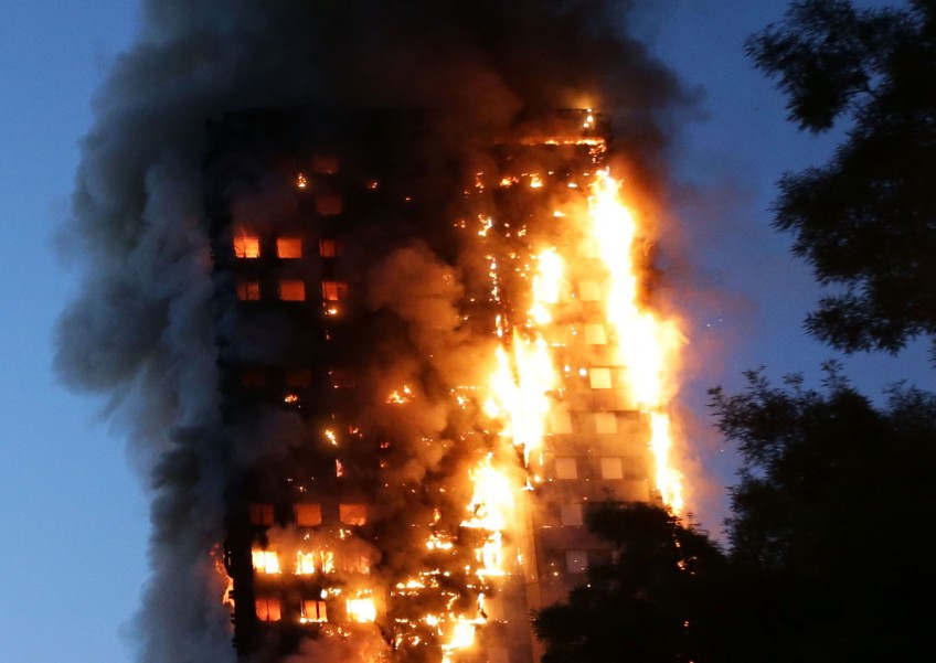 Some dead, at least 50 taken to hospital, as fire engulfs London tower block