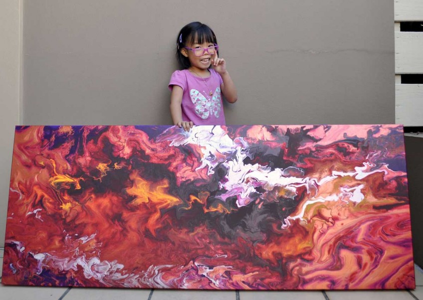 This lil' Picasso is causing big swirls with her paintings