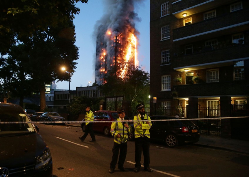Death toll of 12 expected to rise in London tower block fire