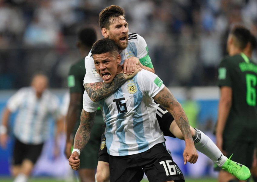 Messi's Argentina save World Cup hopes with last-gasp goal
