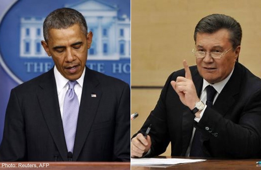 Obama warns Putin against military intervention in Ukraine