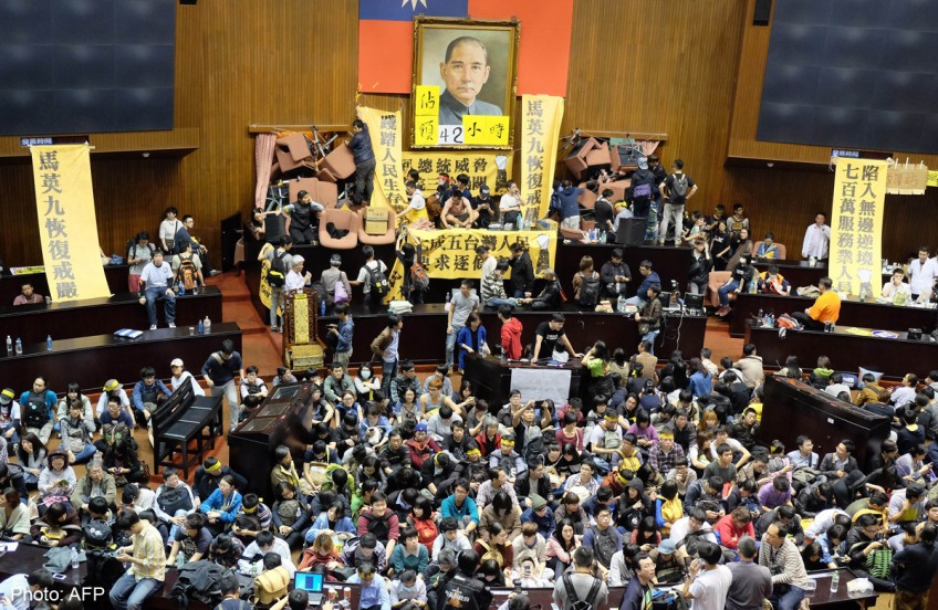 Taiwanese protesters storm Parliament over China trade deal