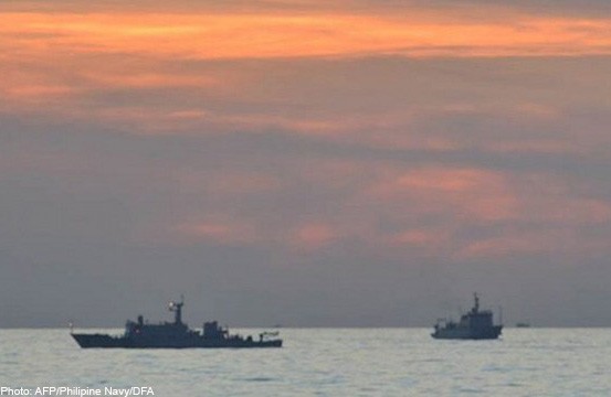 Philippines to defy China, pursue UN case on sea row