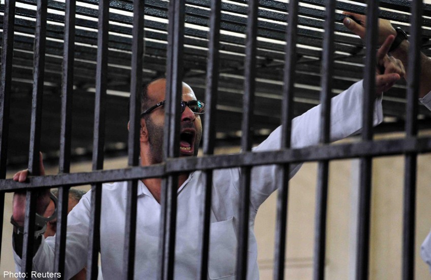 Egypt sentences two Morsi supporters to death: judicial sources