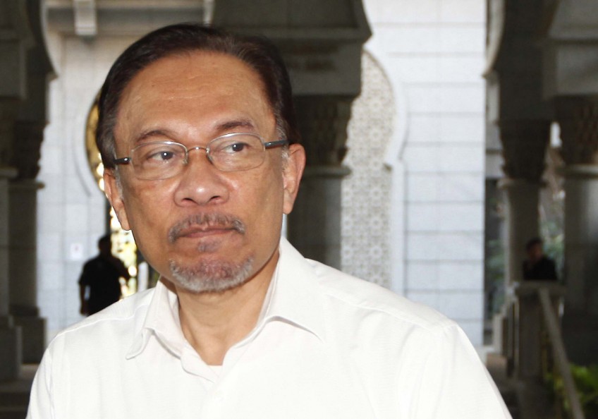 Anwar hits out at Singapore for supporting Malaysia