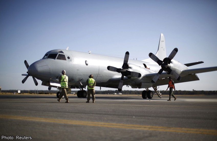 Challenges mount as more countries join Malaysian jet search